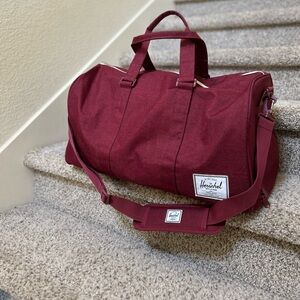 Herschel Supply Company Red Duffel Bag with strap Durable Travel Essential